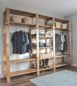 Industrial Style Wood Slat Closet System with Galvanized Pipes by Ana White