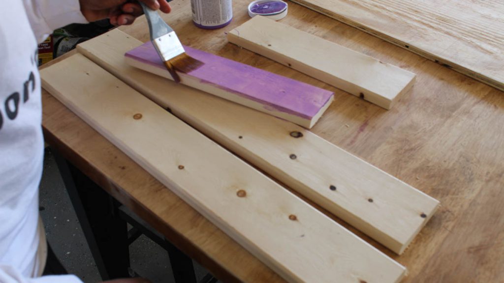 staining boards purple for the vertical succulent garden
